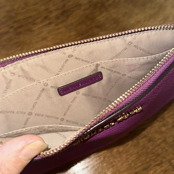 Michael Kors purple wristlet with gold zipper/ accents - Picture 6 of 7